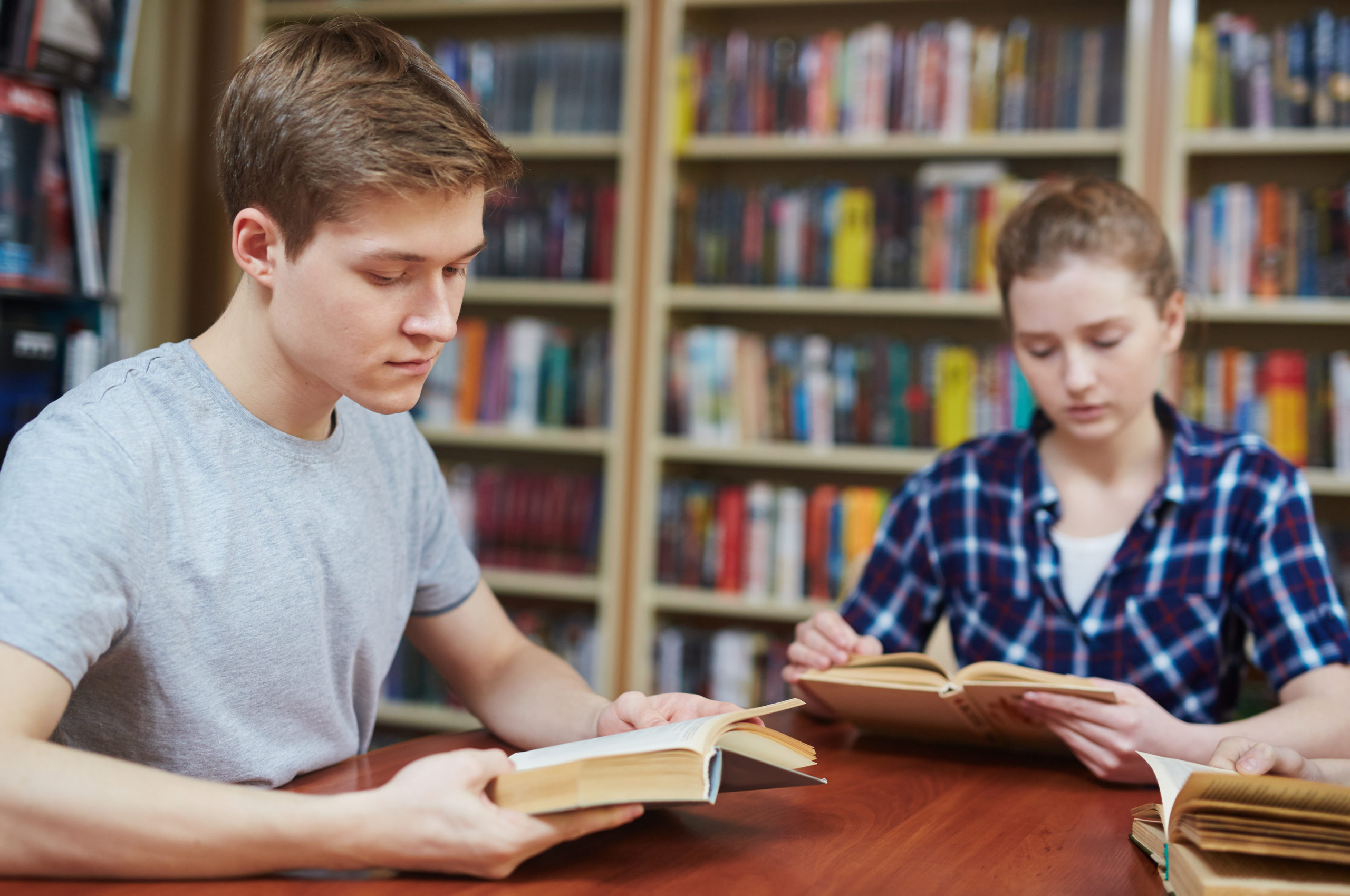 Middle School Students Studying in Library